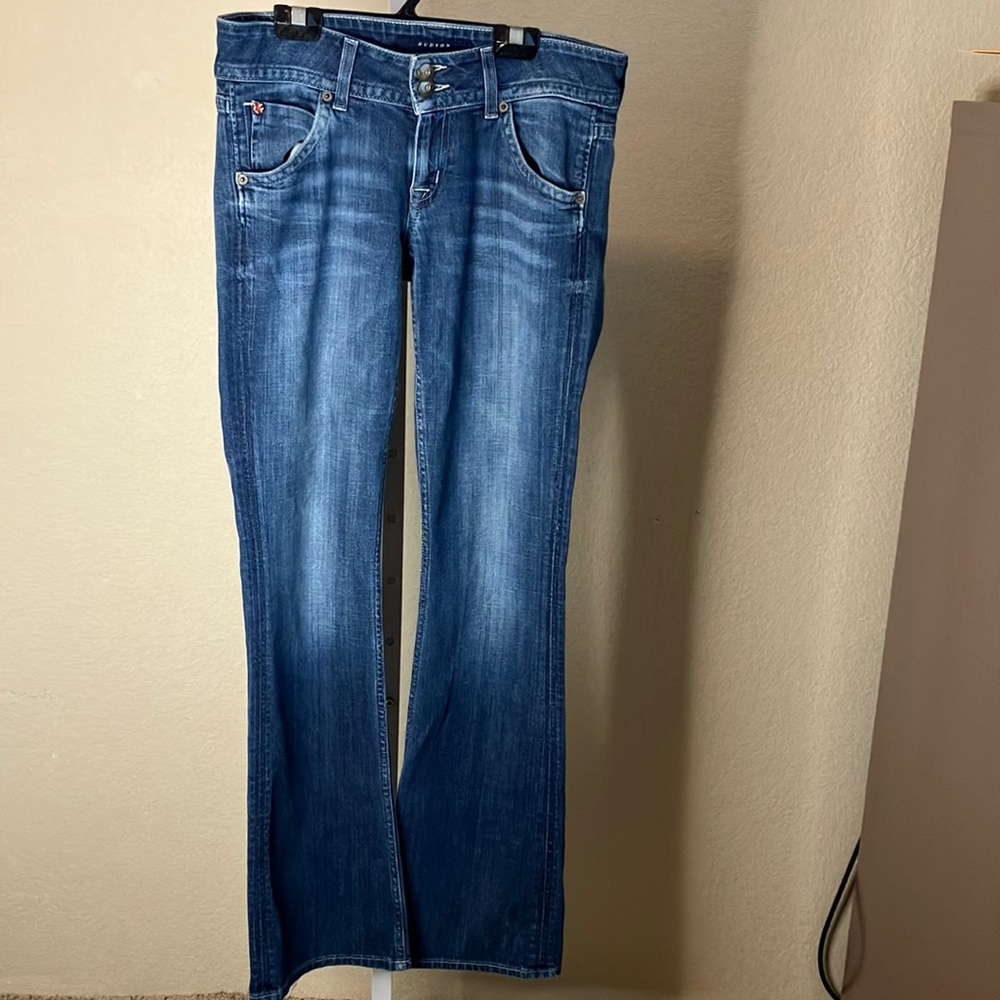 - Hudson well loved denim jeans fading on front of legs. Whiskers on hips.…